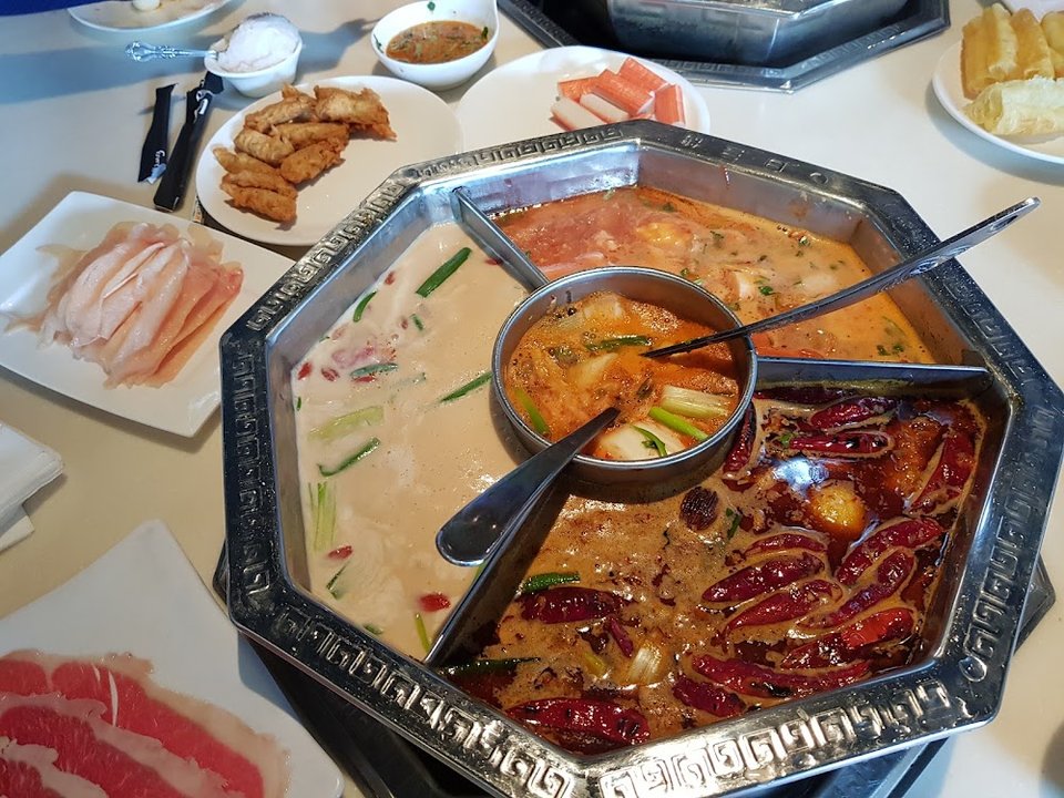 Beverage choices beside hot pot items