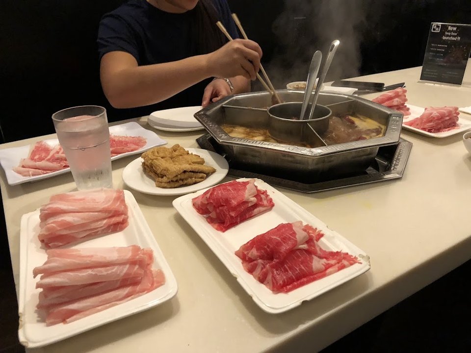 Beverage choices beside hot pot items