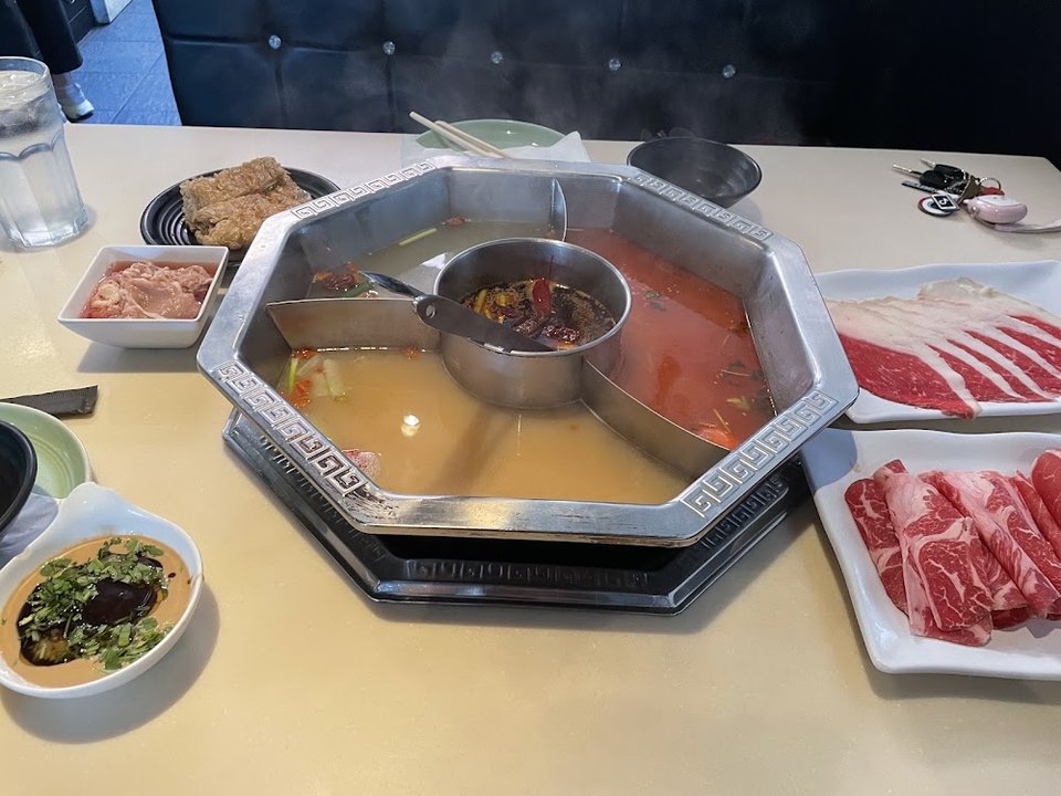 Beverage choices beside hot pot items