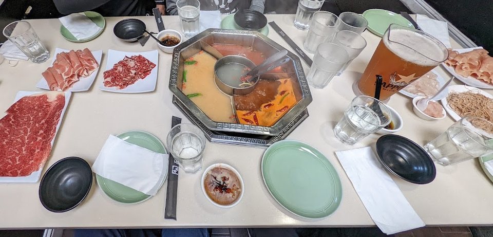 Beverage choices beside hot pot items