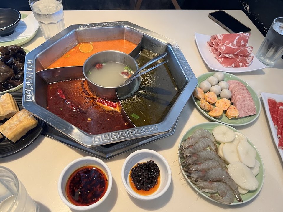 Beverage choices beside hot pot items
